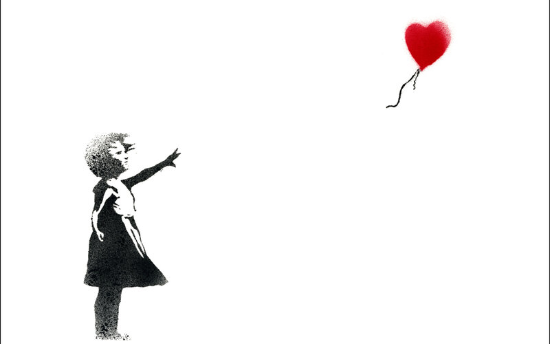 Girl Releasing Heart Balloon