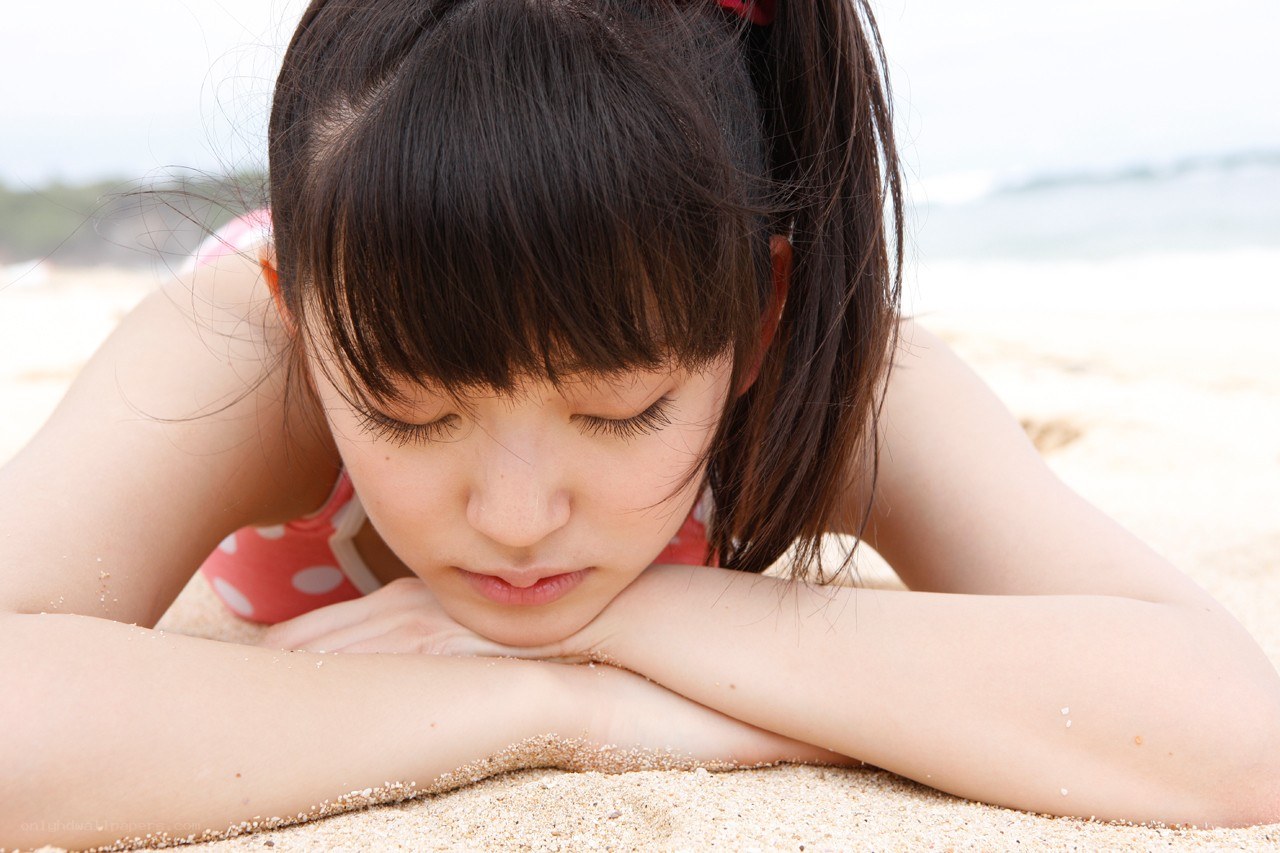 girl resting on beach