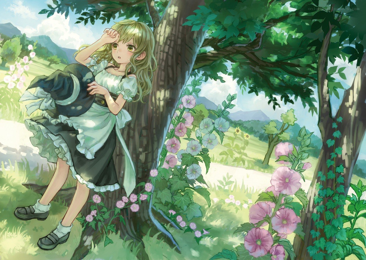 Girl resting under a tree