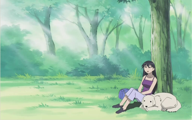 Girl resting with dog in forest