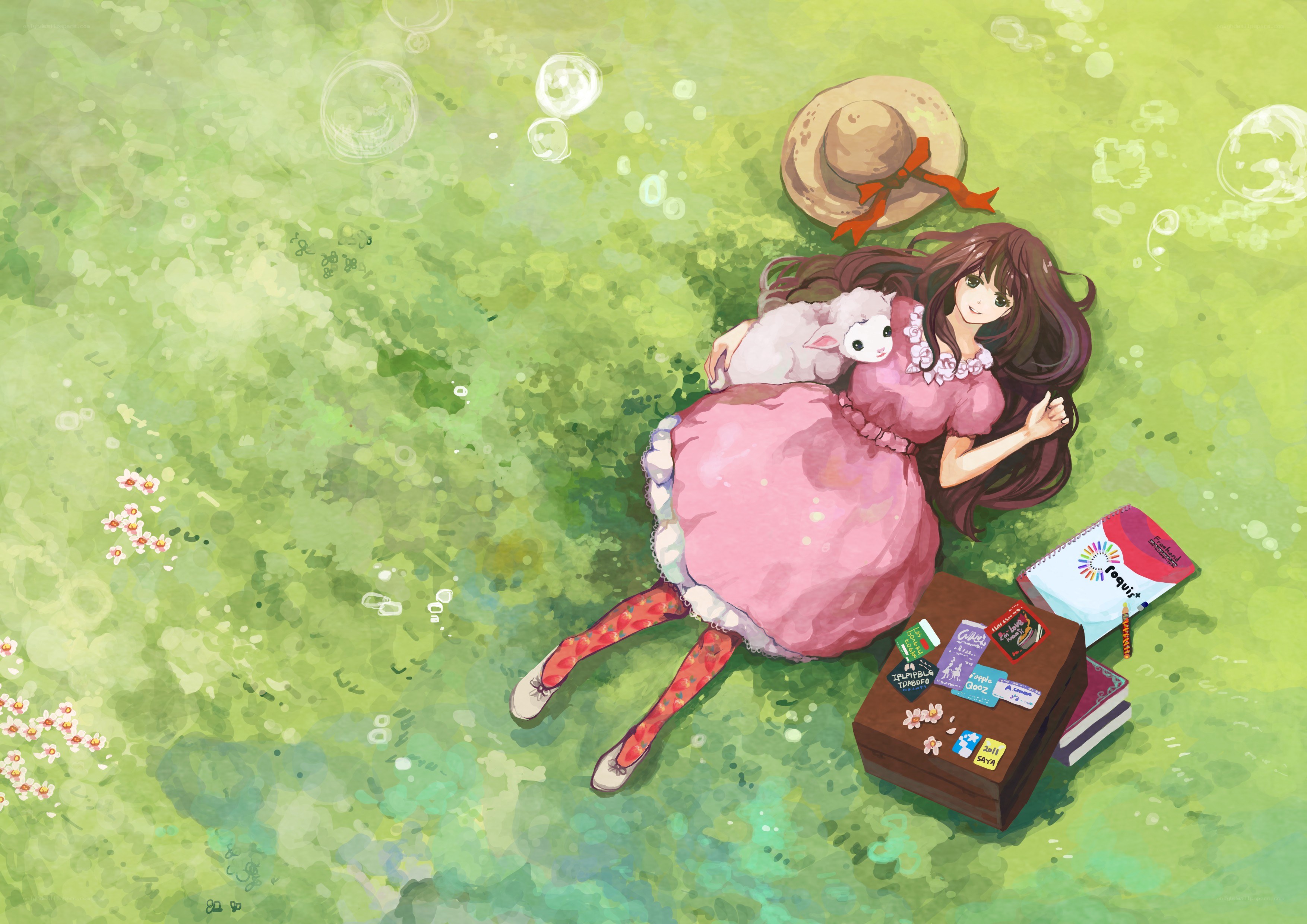 Girl resting with lamb in field