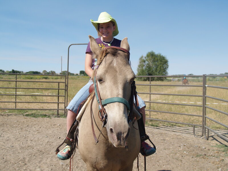 Girl Riding a Horse — Brown, Outdoor, Afternoon, Photograph, Cowboy Hat