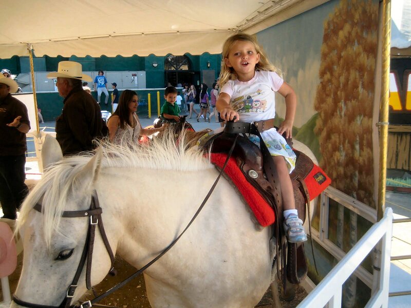 Girl Riding a White Horse