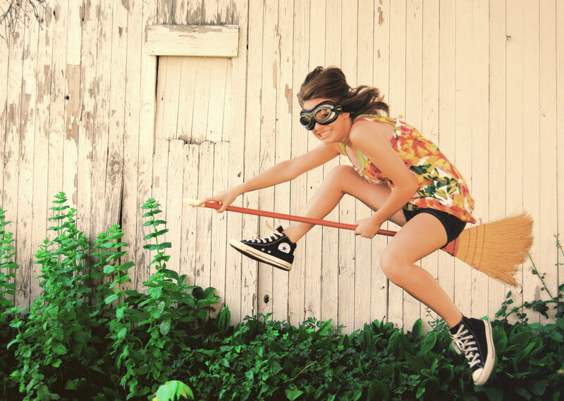 Girl Riding Broomstick