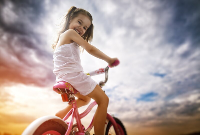 Girl Riding Pink Bike