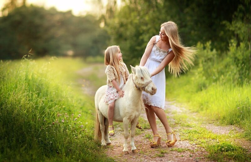 Girl Riding Pony