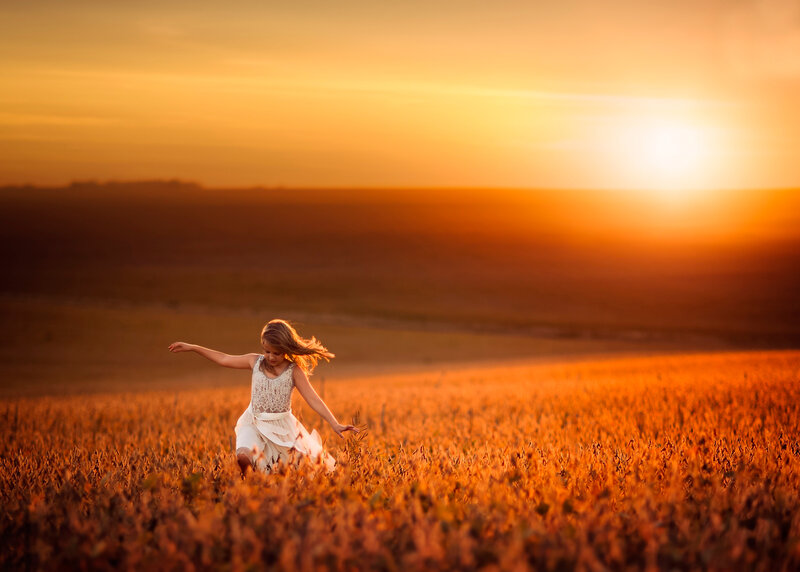 Girl Running in Field — Orange, Serene