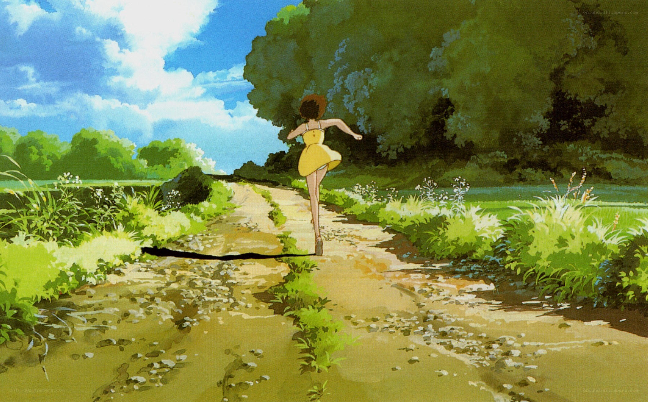 Girl running on a dirt path