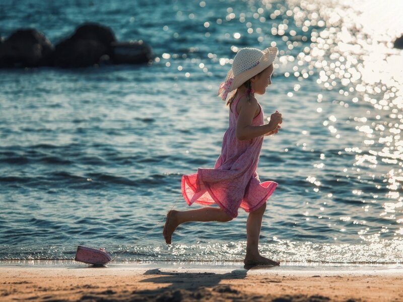 Girl Running on Beach — Blue, Serene, Sunset