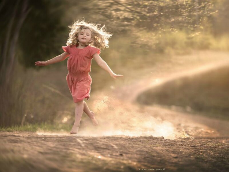 Girl Running on Dirt Path