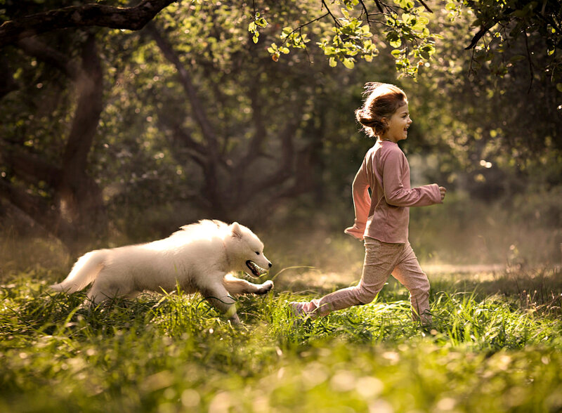 Girl Running with Dog