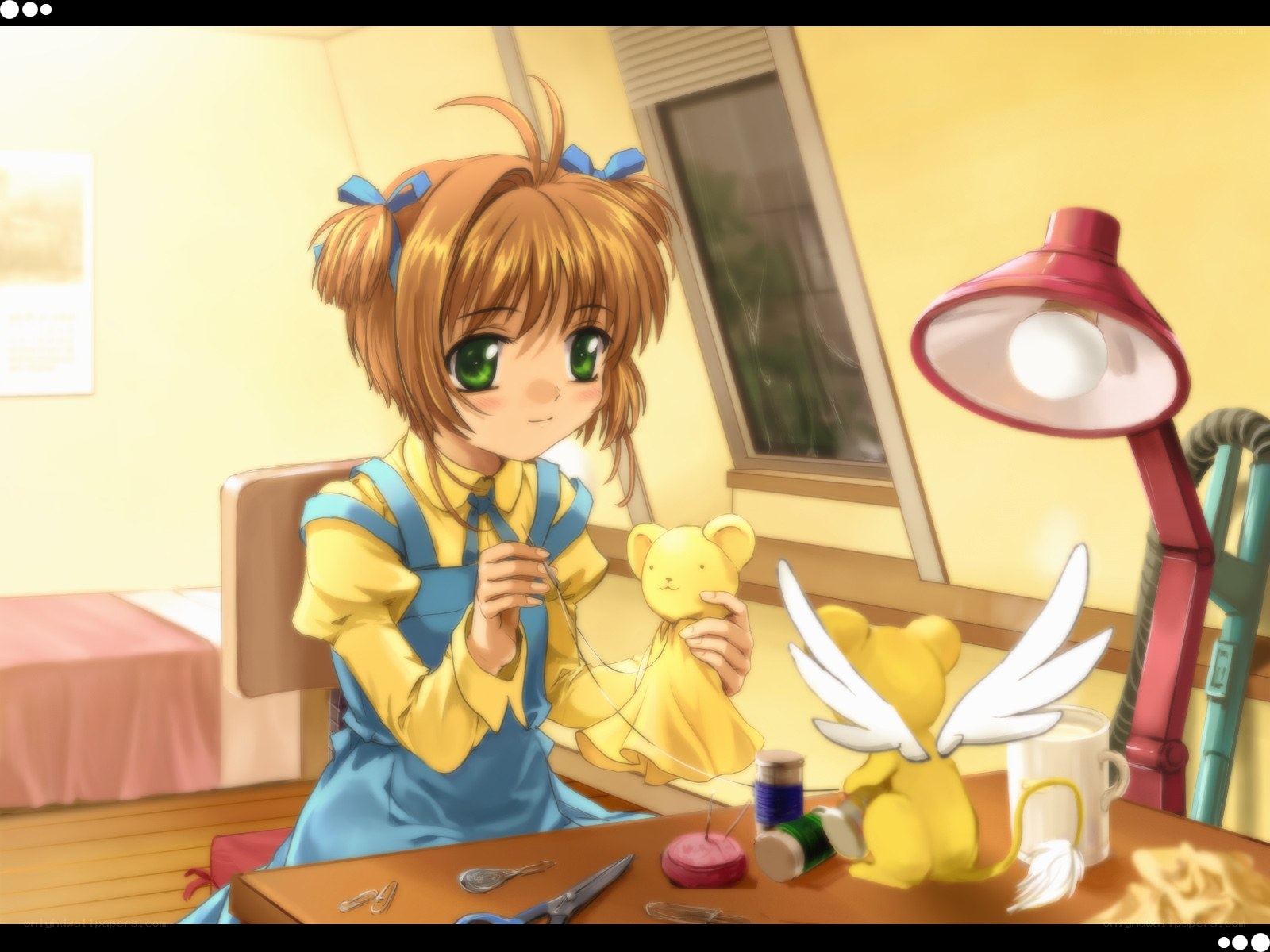 girl sewing a stuffed animal