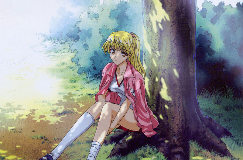 girl sitting by a tree