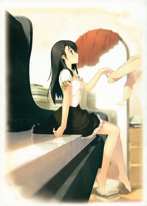 girl sitting by piano