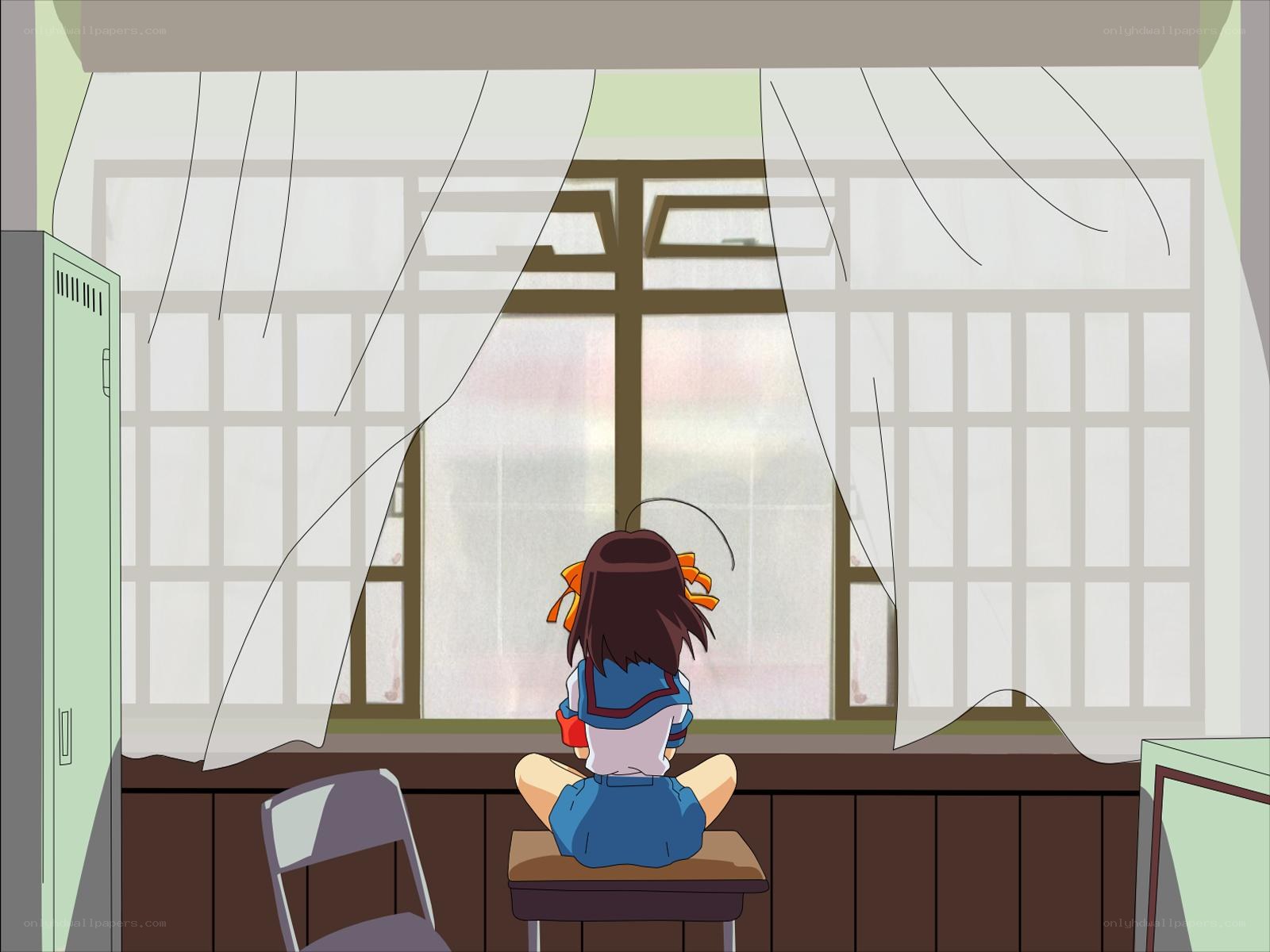 Girl sitting by the window