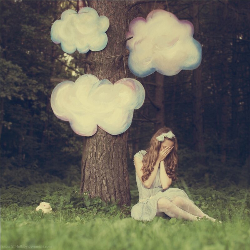 Girl Sitting by Tree