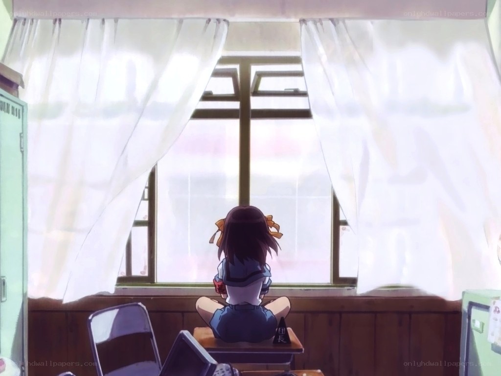 girl sitting by window