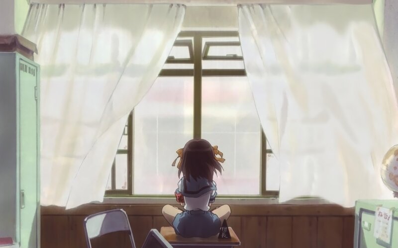 girl sitting by window