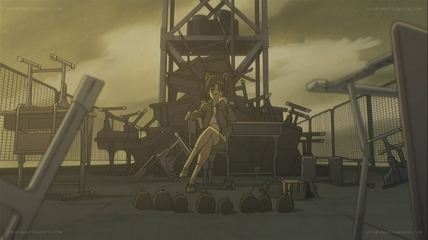 girl sitting in a junkyard
