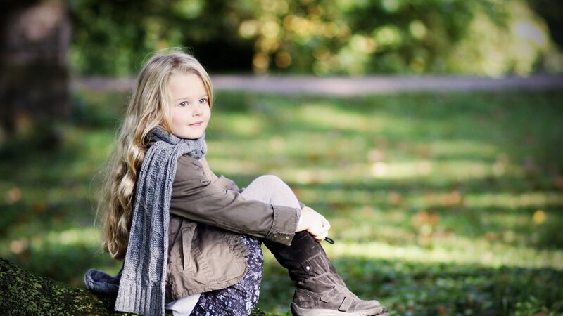 girl sitting in a park