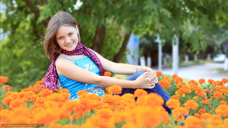 Girl Sitting in Flowers