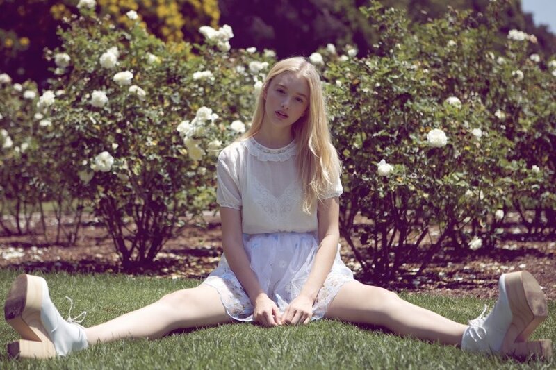 girl sitting in garden