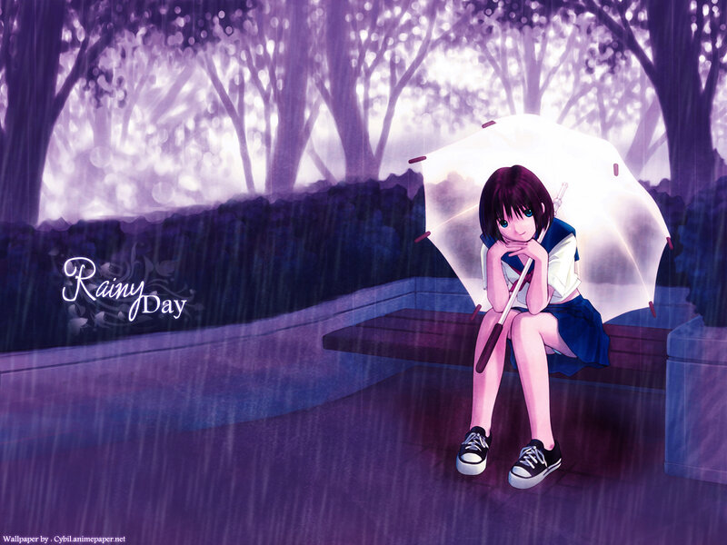 Girl sitting in the rain