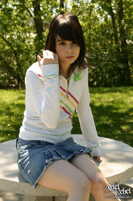 girl sitting on a bench