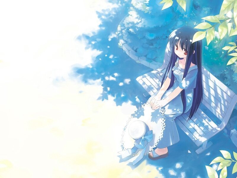 girl sitting on a bench in sunlight