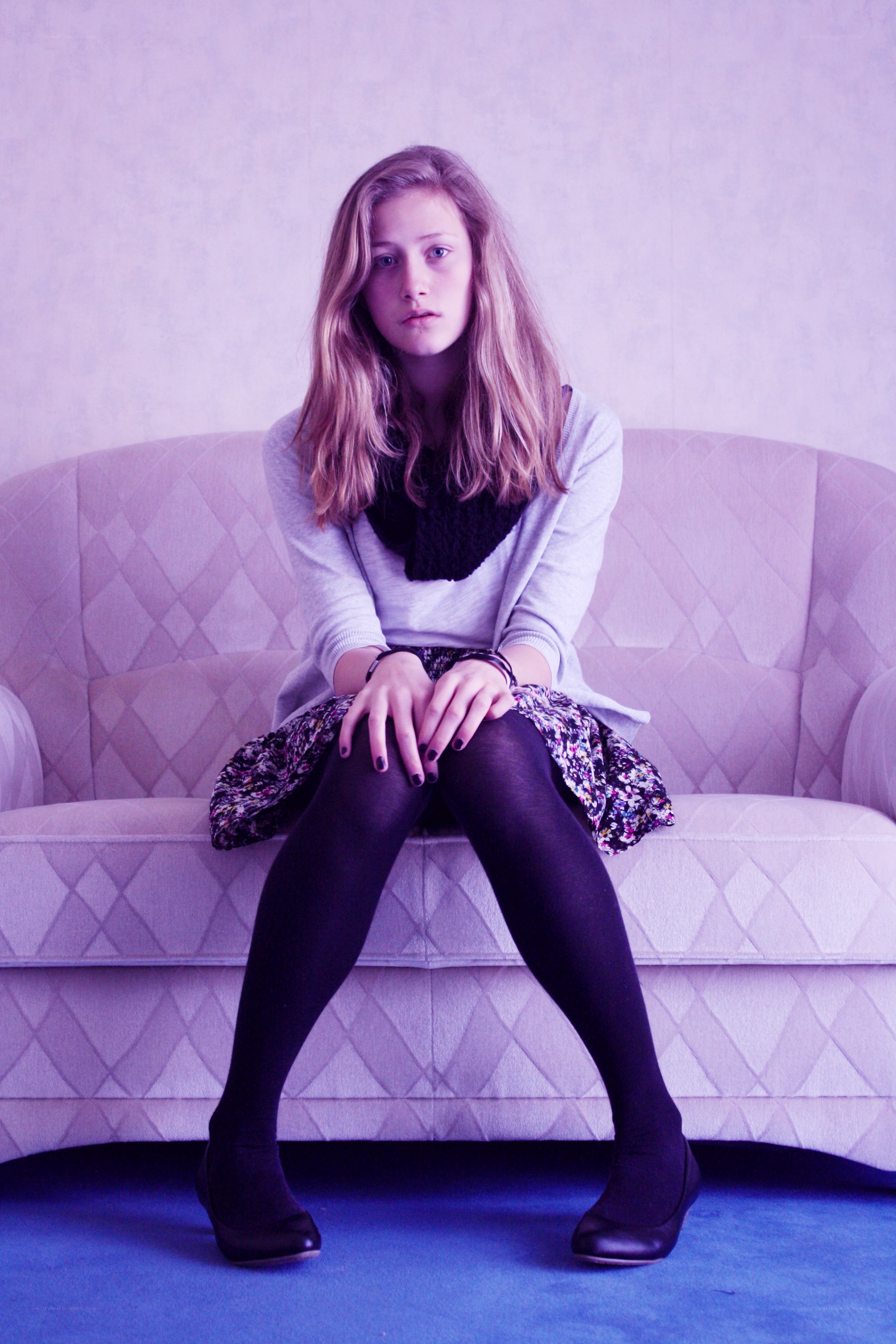 girl sitting on a couch