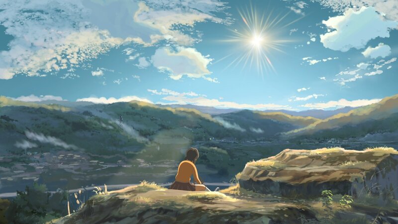 Girl Sitting on a Hill