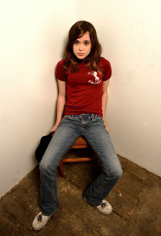 girl sitting on a stool