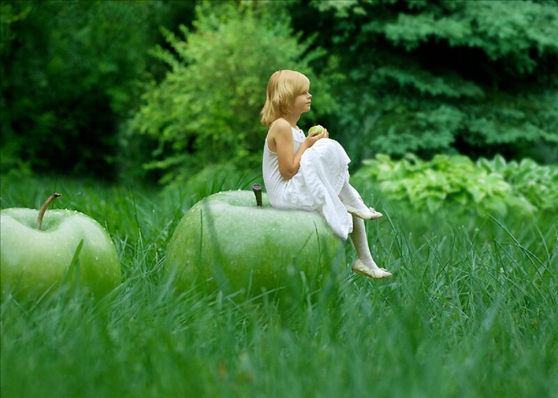 Girl Sitting on Apple