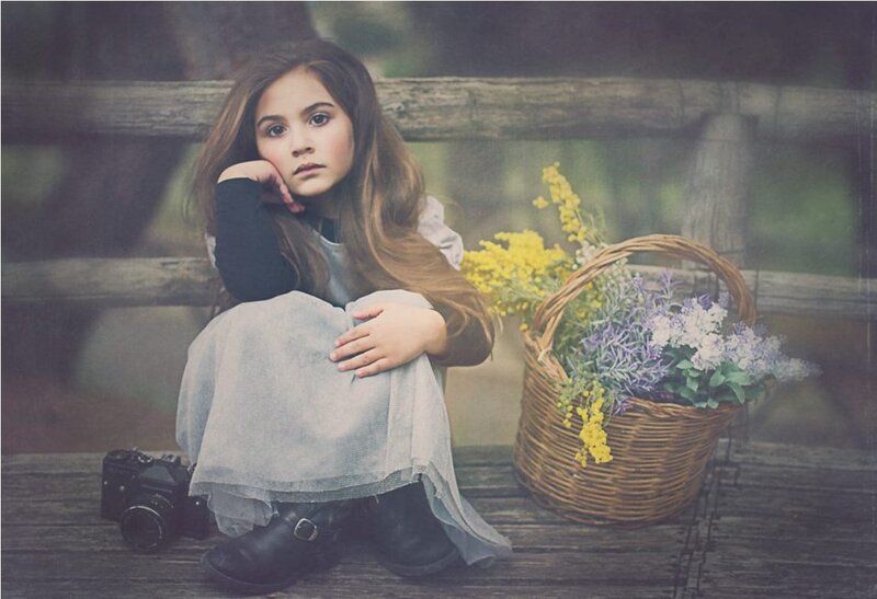 Girl Sitting on Bench — Brown