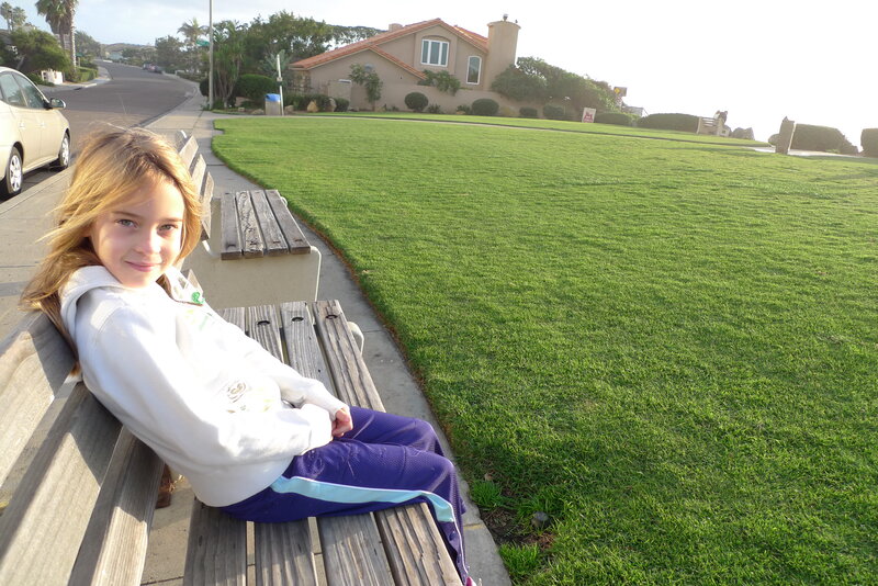 Girl Sitting on Bench — Green, Calm