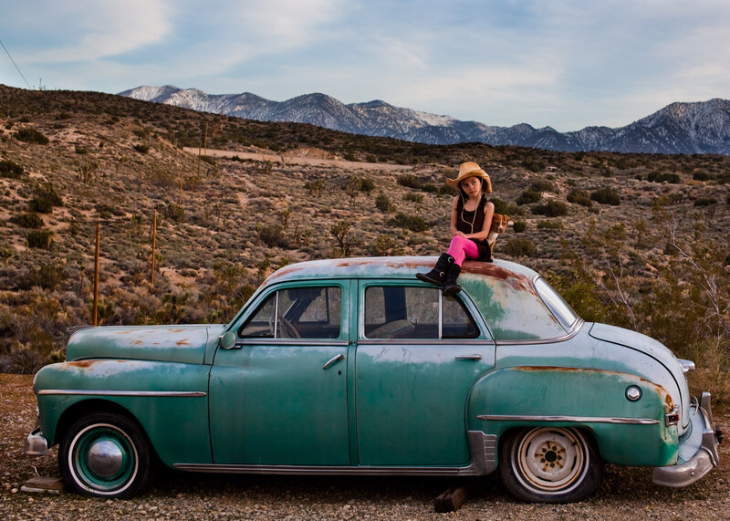 Girl Sitting on Car — Green