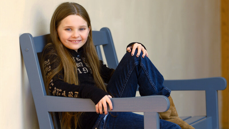 Girl Sitting on Chair