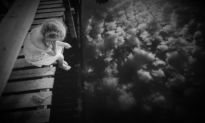 Girl Sitting on Dock — Black