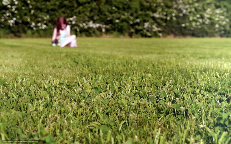 Girl sitting on grass