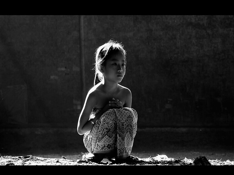 Girl Sitting on Ground — Black