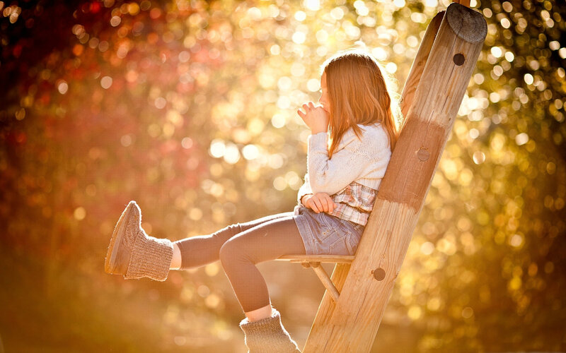 Girl Sitting on Ladder — Gold