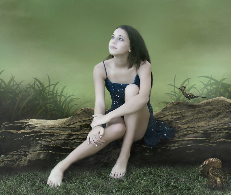 Girl Sitting on Log