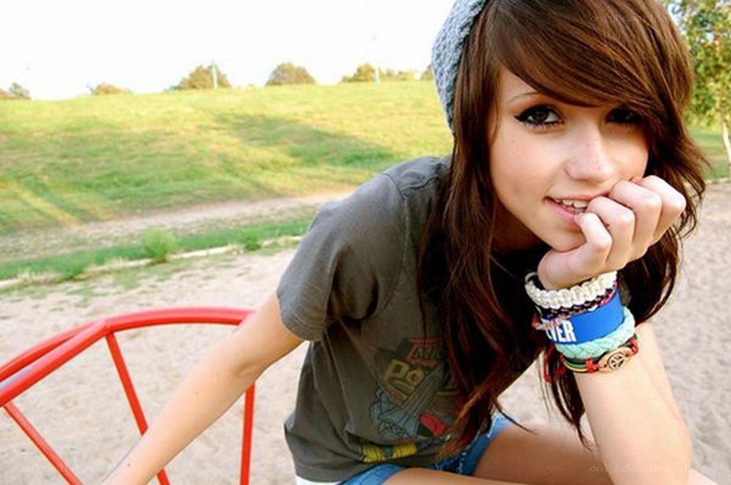 girl sitting on playground