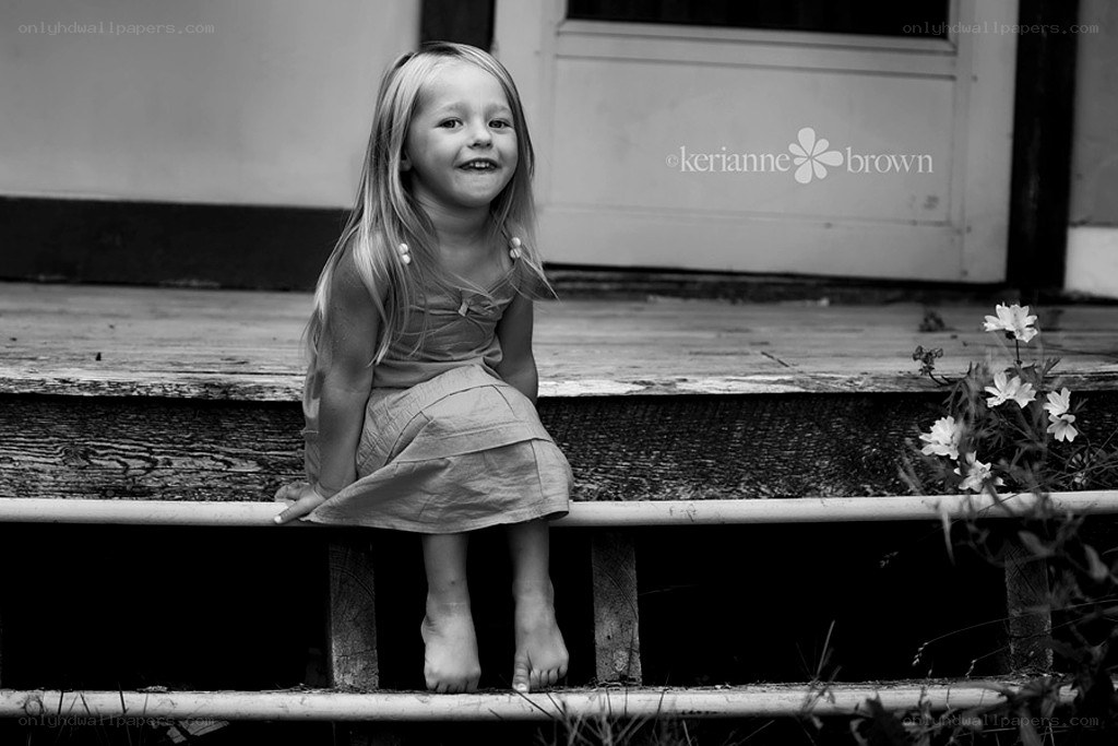 girl sitting on porch steps