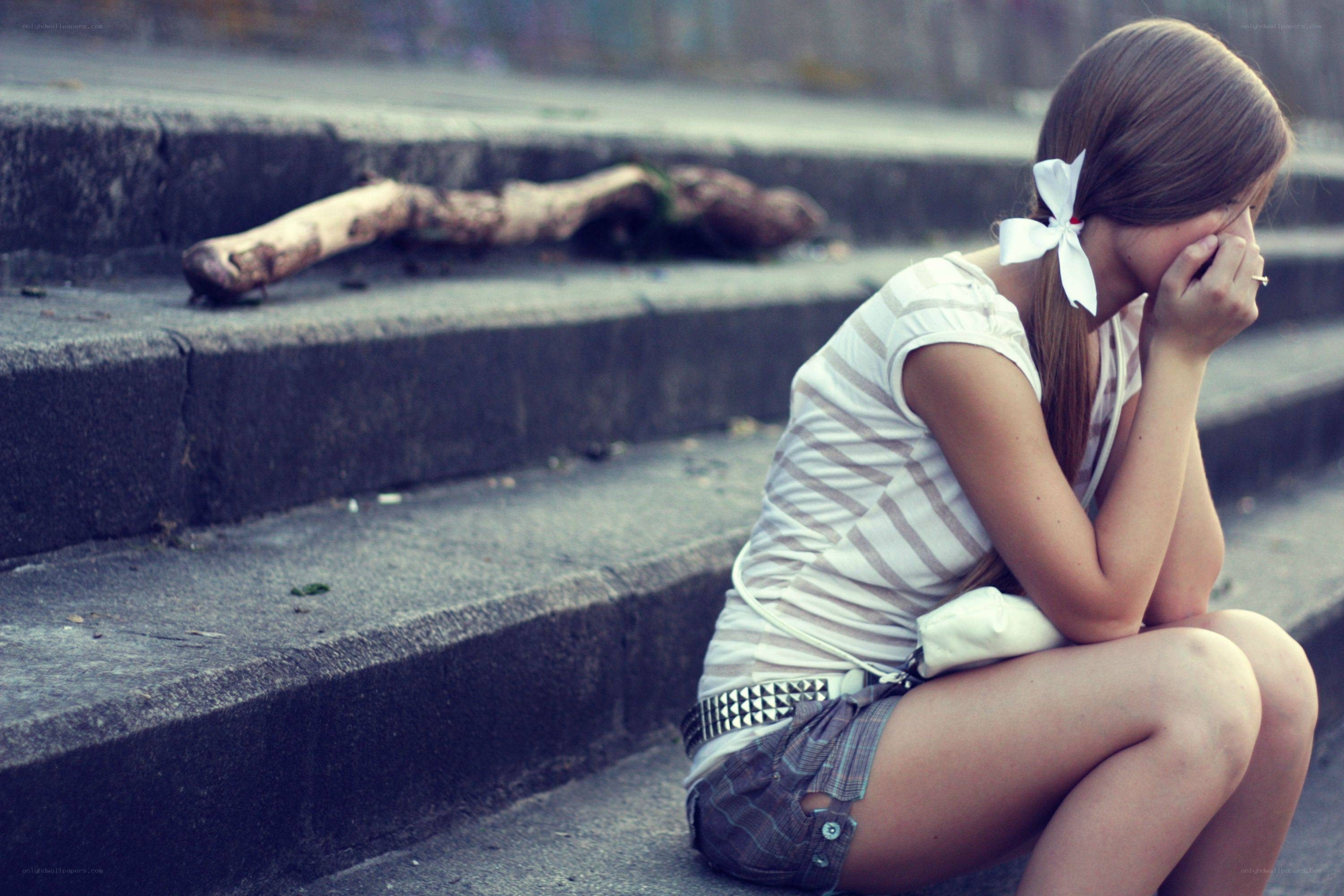 girl sitting on steps