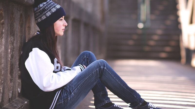 girl sitting on steps
