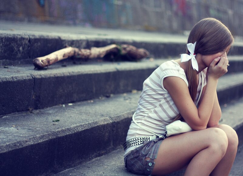 Girl Sitting on Steps — Gray, Melancholic, Photograph, Stick, White Bow