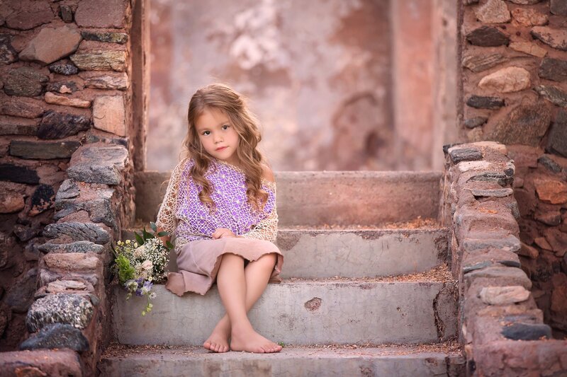 Girl Sitting on Stone Steps — Purple