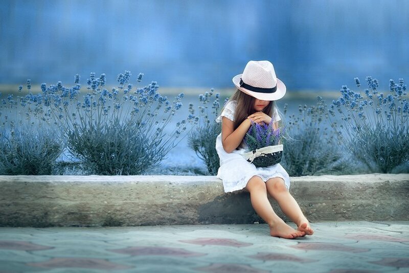 Girl Sitting on Wall — Blue