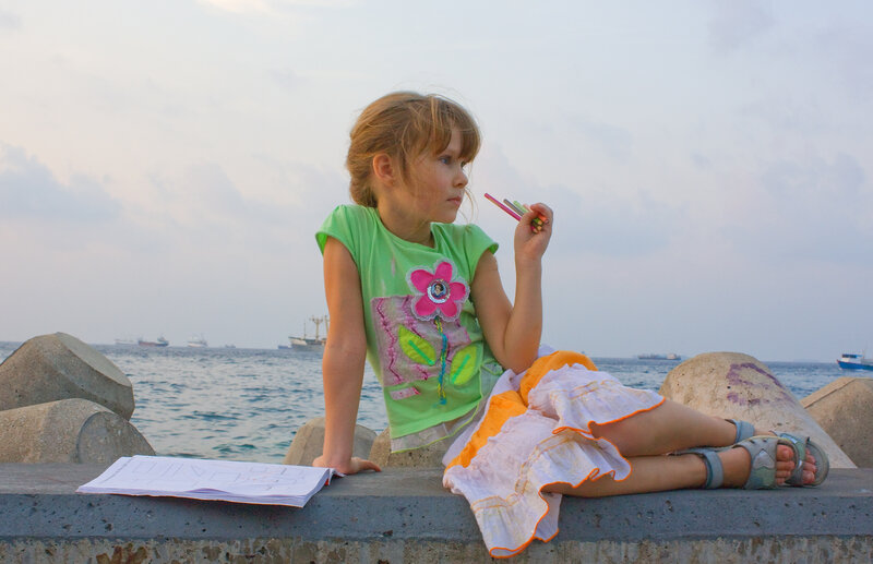 Girl Sitting on Wall — Green